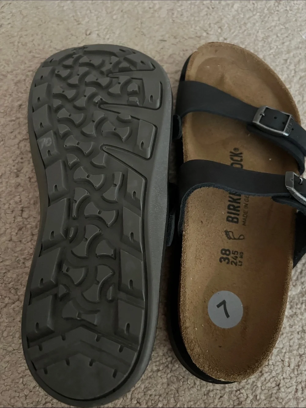 Birkenstock women’s black striped sandals